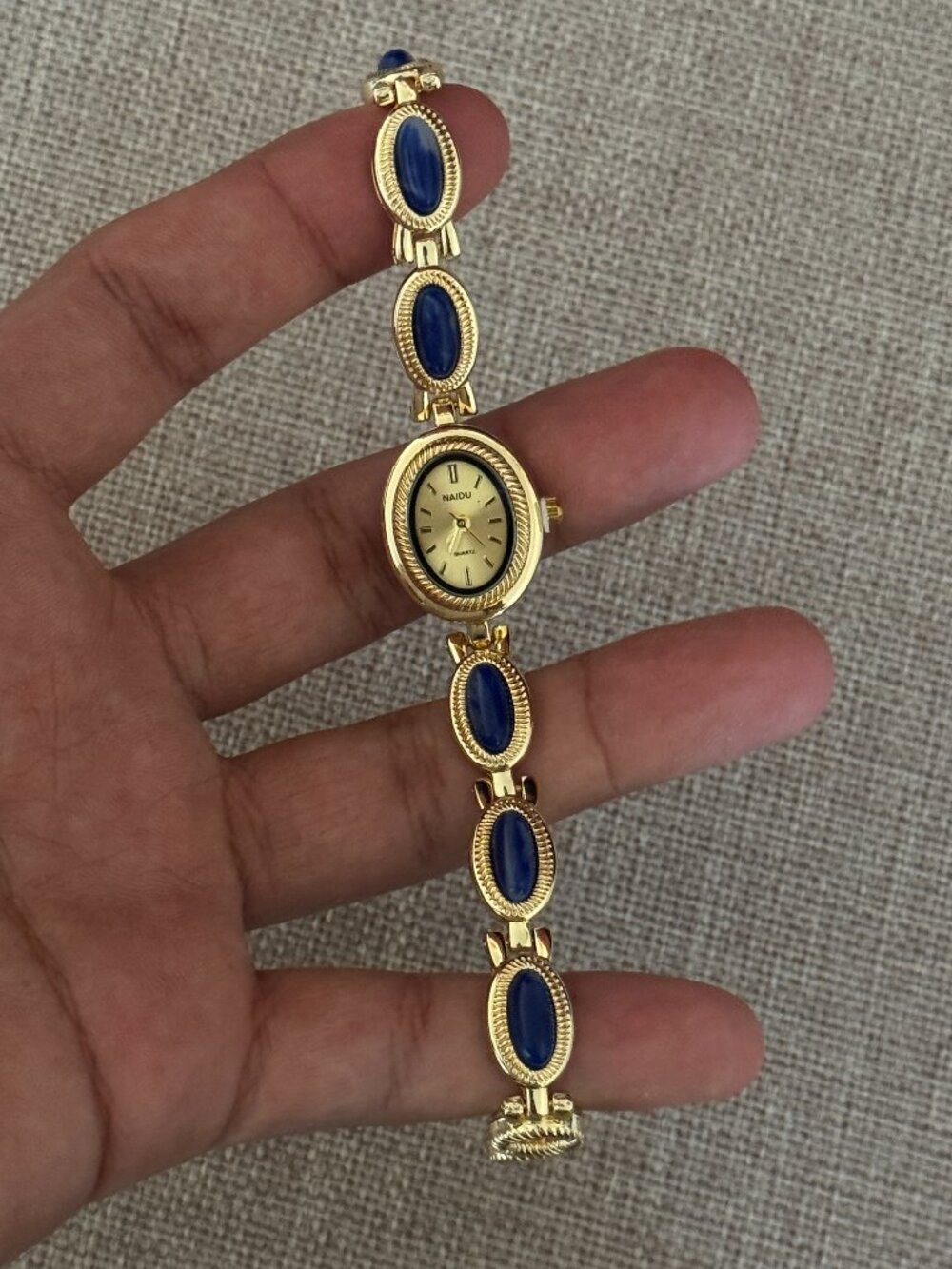 Gold Oval Watch Navy Blue Stone Link Band